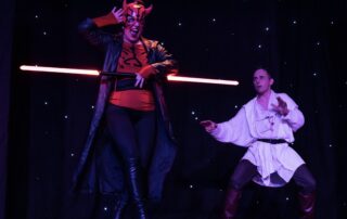 Martin Blais visible in a stage photo from La Guerre des Cônes at Fringe 2025, view 15