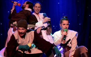 Martin Blais visible in a stage photo from La Guerre des Cônes at Fringe 2025, view 14