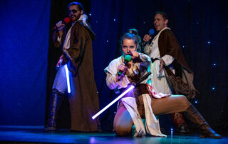 Martin Blais visible in a stage photo from La Guerre des Cônes at Fringe 2025, view 12