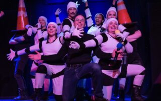 Martin Blais visible in a stage photo from La Guerre des Cônes at Fringe 2025, view 2