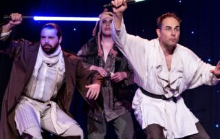 Martin Blais visible in a stage photo from La Guerre des Cônes at Fringe 2025, view 18